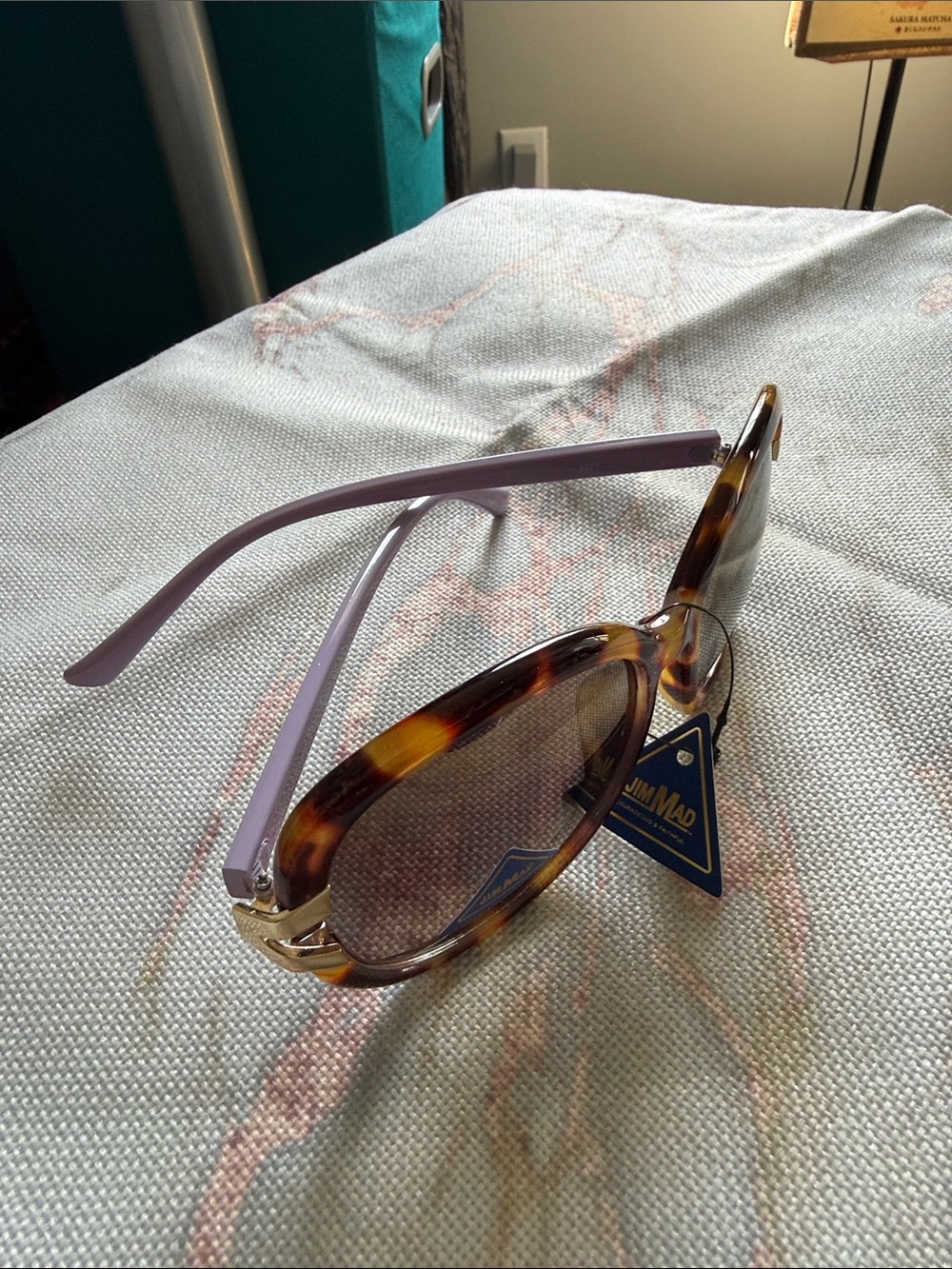 Tortoiseshell Oval Sunglasses with Lavender Temples